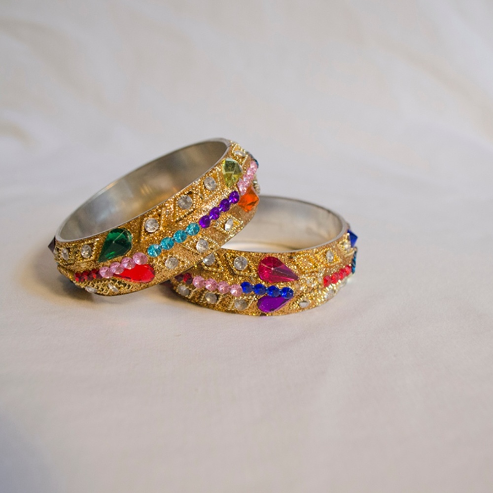 Gold and Bejeweled Bracelets